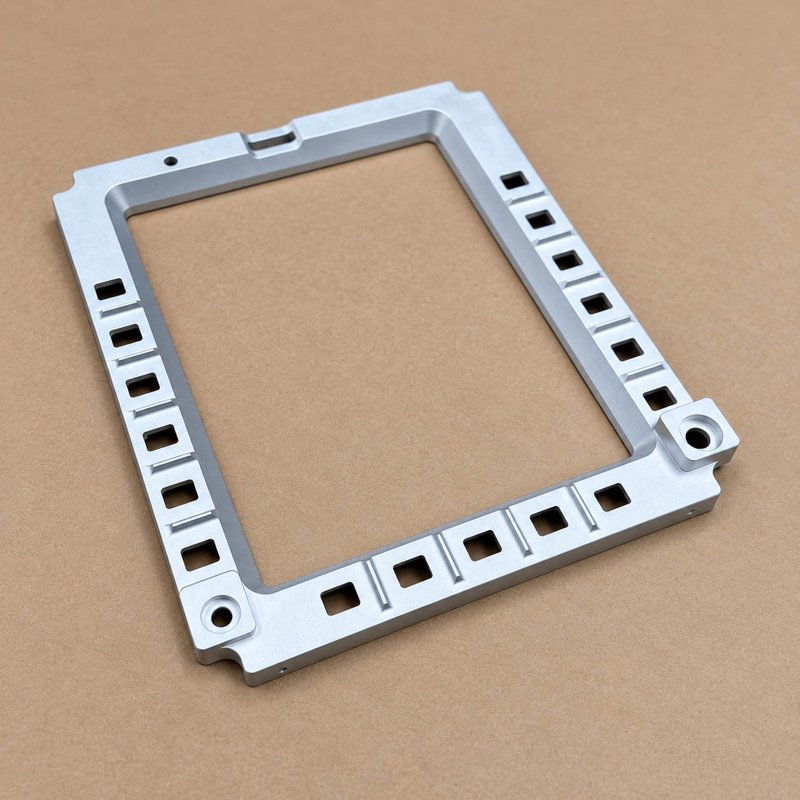 Rectangular aluminum frame with evenly spaced mounting slots
